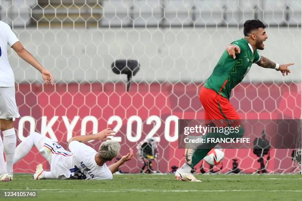 Mexico's forward Alexis Vega celebrates scoring the opening goal during the Tokyo 2020 Olympic Games men's group A first round football match between...