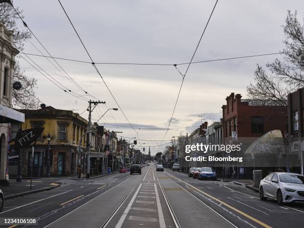 Brunswick Street is near-empty in the Fitzroy suburb of Melbourne, Australia, on Thursday, July 22, 2021. Australia has been hit hard by renewed...
