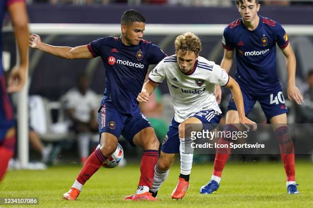 United forward Griffin Yow battles with Chicago Fire defender Miguel Angel Navarro in action during a game between the Chicago Fire and D.C. United...