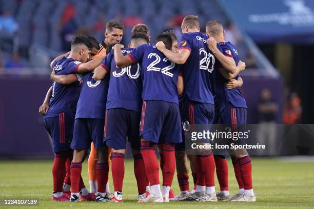 Chicago Fire starting XI gather in a huddle in action during a game between the Chicago Fire and D.C. United on July 21, 2021 at Soldier Field in...