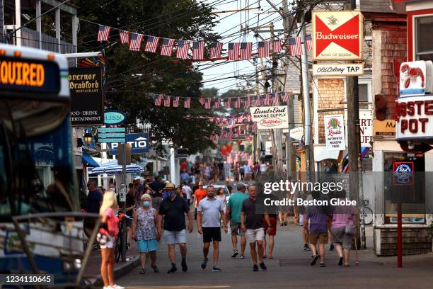 Provincetown, MA Foot traffic along Commercial street in Provincetown, MA on July 20, 2021. Provincetown officials have issued a new mask-wearing...