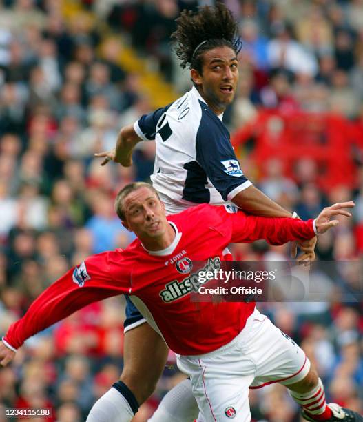 Premiership Football, Charlton Athletic v Tottenham Hotspur, Mido of Tottenham out-jumps Chris Perry of Charlton.