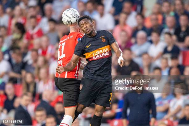 Philipp Max of PSV Eindhoven ans Jesse Sekidika Battle for the ball during the UEFA Champions League Qualifiers Match between PSV Eindhoven and...