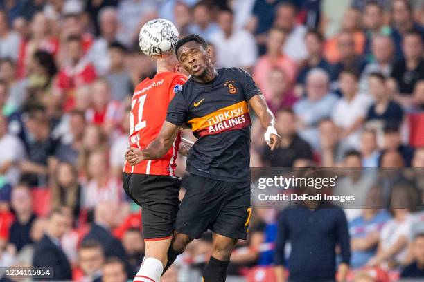 Philipp Max of PSV Eindhoven ans Jesse Sekidika Battle for the ball during the UEFA Champions League Qualifiers Match between PSV Eindhoven and...