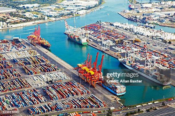 ariel view over docklands - aangemeerd stockfoto's en -beelden