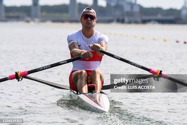 Canada's Trevor Jones competes in the men's single sculls rowing heats during the Tokyo 2020 Olympic Games at the Sea Forest Waterway in Tokyo on...