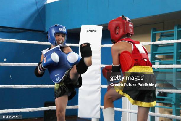 Child boxers wrestle during the Muay Thai Championship of Ukraine in Odesa, southern Ukraine.