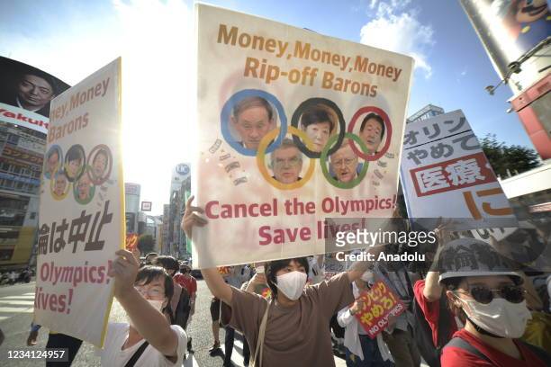 People protest against the Opening ceremony of 2020 Tokyo Summer Olympic Games on July 23, 2020 in Tokyo, Japan, as they ask for the cancel of the...