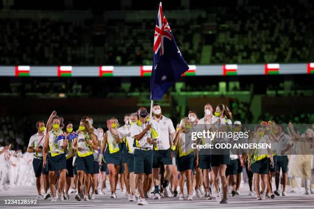 Australia's flag bearers Patty Mills and Cate Campbell lead their delegation as they parade during the opening ceremony of the Tokyo 2020 Olympic...