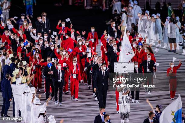 The team from Russia runs into the Olympic Stadium at the opening of the Tokyo Olympics. Tokyo 2020 Olympic Games Day 0 - Opening Ceremony at Olympic...