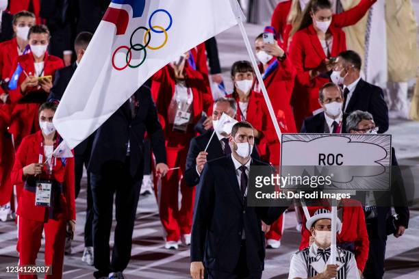 The team from Russia runs into the Olympic Stadium at the opening of the Tokyo Olympics. Tokyo 2020 Olympic Games Day 0 - Opening Ceremony at Olympic...