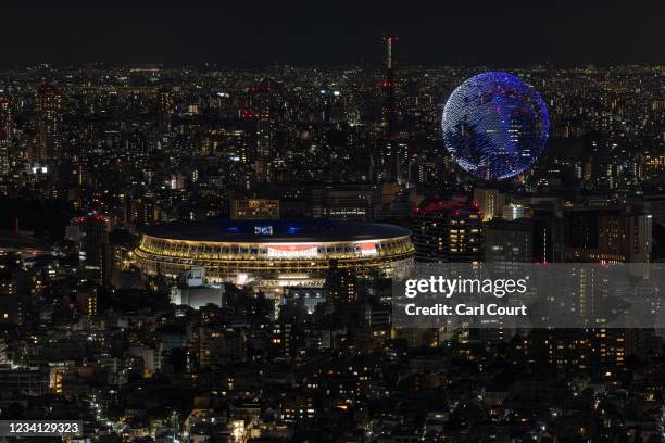 Drone display flies during the Opening Ceremony of the Tokyo 2020 Olympic Games at Olympic Stadium on July 23, 2021 in Tokyo, Japan.