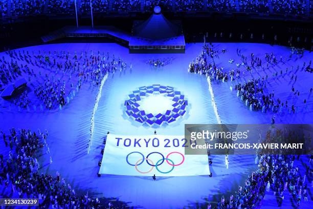 An overview shows the Tokyo 2020 emblem during the opening ceremony of the Tokyo 2020 Olympic Games, at the Olympic Stadium, in Tokyo, on July 23,...