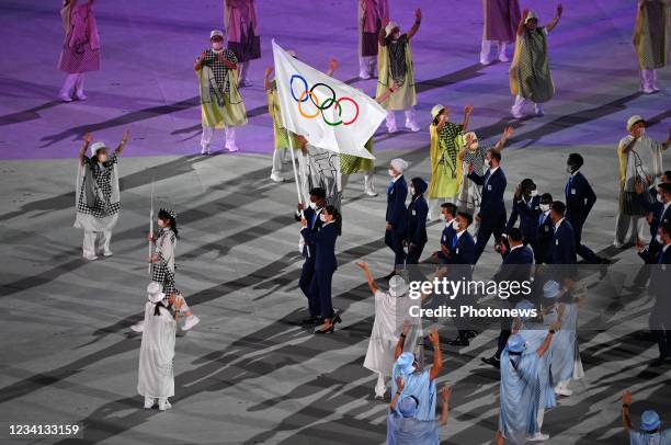 Mardini Yusra and Tachlowini Gabriyesos carry the flag of the Refugee Olympic Team during the Opening Ceremony of the Tokyo 2020 Summer Olympic Games...