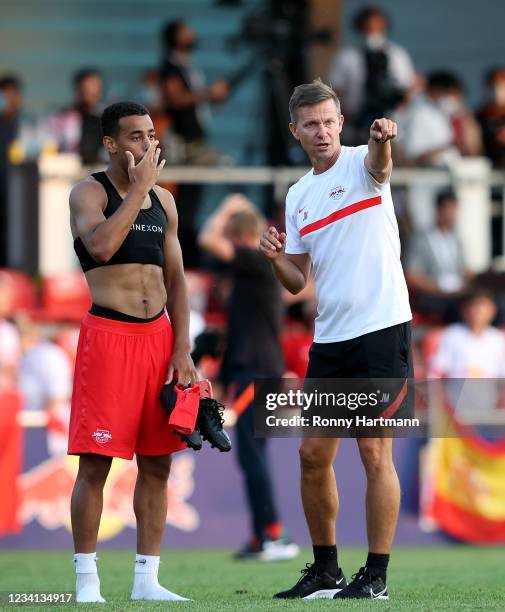 Head coach Jesse Marsch of RB Leipzig chats with Tyler Adams of RB Leipzig after the pre-season friendly match between RB Leipzig and HSC Montpellier...