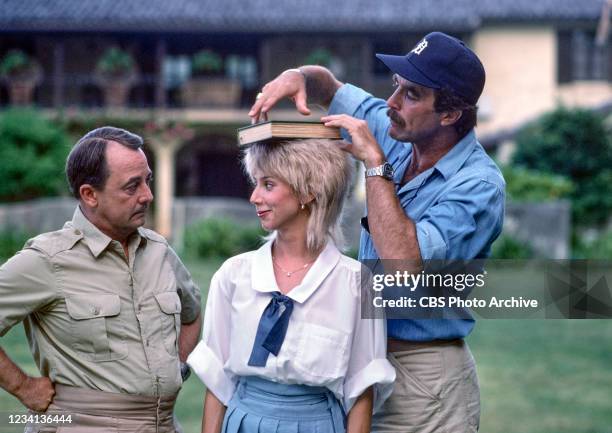 Pictured from left is John Hillerman , Jillie Mack , Tom Selleck in the MAGNUM PI episode, "Professor Jonathan Higgins," which aired January 10, 1985.