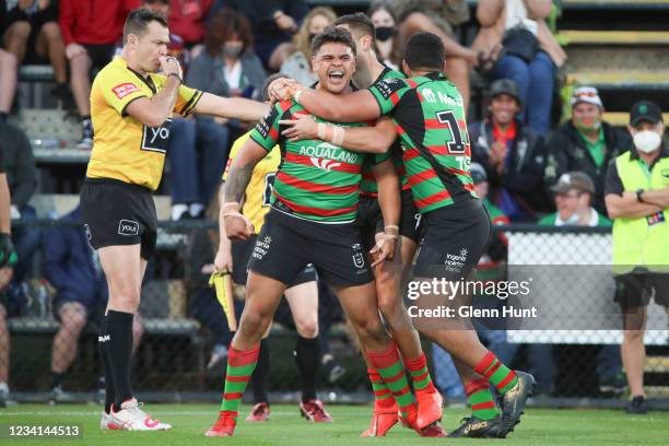 Latrell Mitchell of the Rabbitohs celebrates scoring a try during the round 19 NRL match between the South Sydney Rabbitohs and the New Zealand...