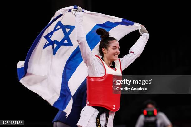 Abishag Semberg of Israel celebrates after winning against Rukiye Yildirim of Turkey in bronze medal match of taekwondo branch during the Tokyo 2020...