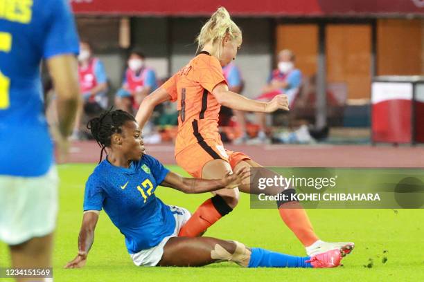 Brazil's forward Ludmila fouls Netherlands' midfielder Jackie Groenen during the Tokyo 2020 Olympic Games women's group F first round football match...