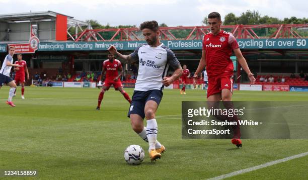Preston North End's Sean Maguire shields the ball from Accrington Stanley's Ross Sykes during the Pre-Season Friendly match between Accrington...