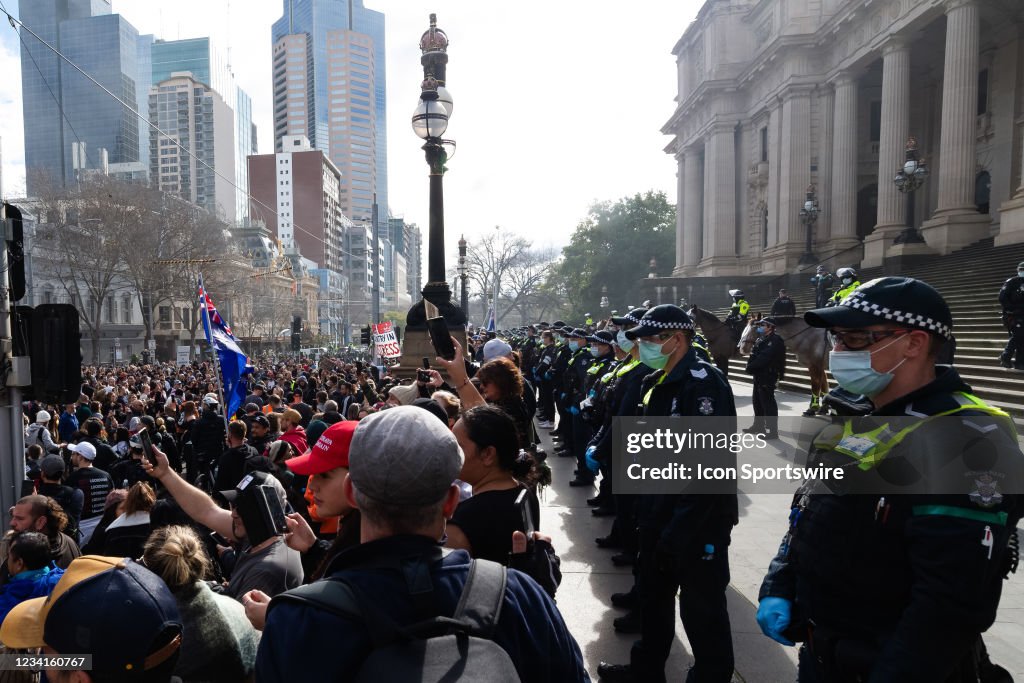 Freedom Rally Melbourne A general view of demonstrators and police outside the Parliament ...