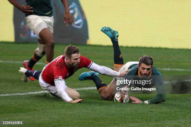 Willie le Roux of South Africa dives over the tryline during the Castle Lager Lions Series 1st Test match between South Africa and British and Irish...