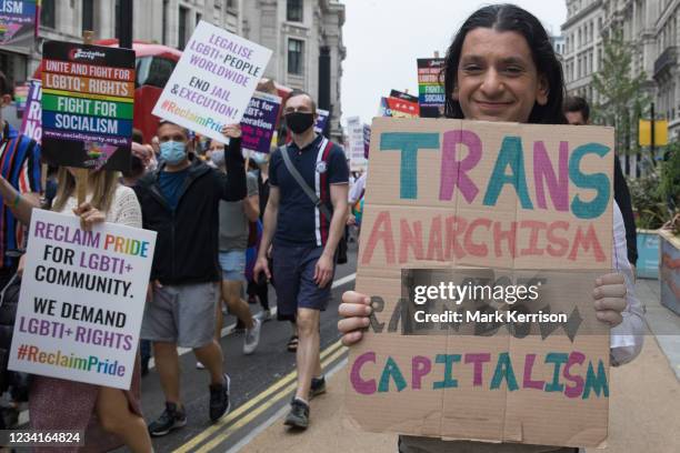Thousands of LGBTI+ protesters pass along Regent Street on the first-ever Reclaim Pride march on 24th July 2021 in London, United Kingdom. Reclaim...
