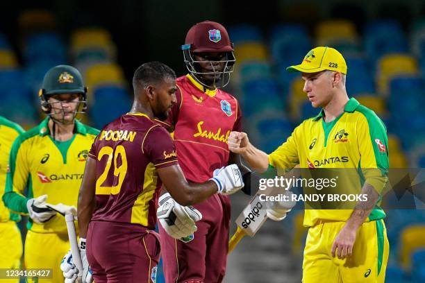Nicholas Pooran and Alzarri Joseph of West Indies congratulated by Adam Zampa of Australia for winning the 2nd ODI between West Indies and Australia...