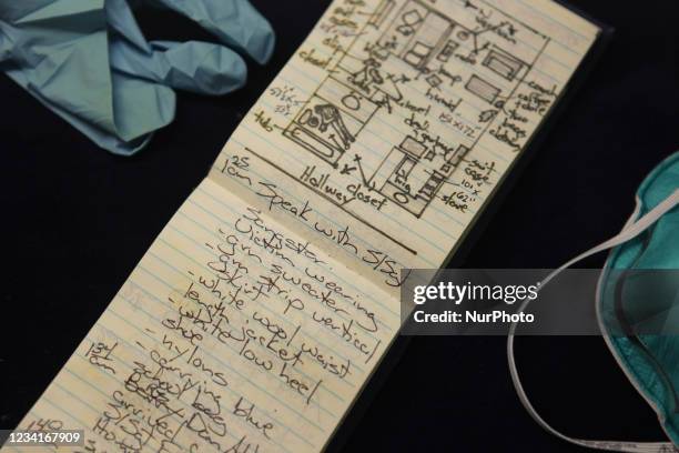 Police officer's notebook from a murder crime scene on display in a classroom at a college teaching Crime Scene Investigation in Toronto, Ontario,...