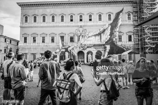 Image has been converted to black and white.) General view during the show of the art installation ''Punto di Fuga'' by JR on Palazzo Farnese on July...