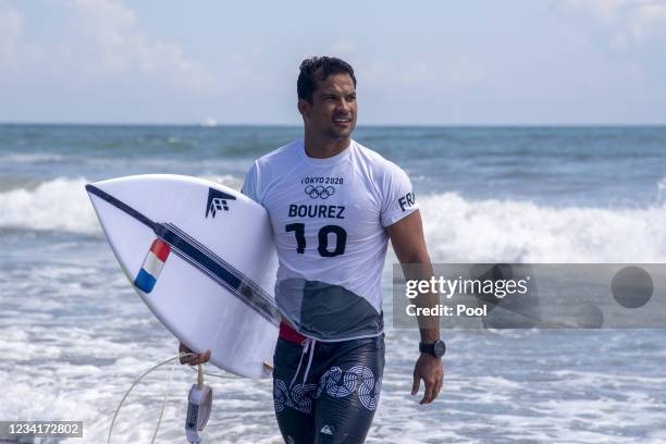 France's Michel Bourez leaves the water after his heat during the men's Surfing first round on day two of the Tokyo 2020 Olympic Games at Tsurigasaki...