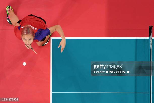 An overview image shows Hong Kong's Minnie Soo Wai-yam competing in the women's singles round 2 table tennis match against Spain at the Tokyo...