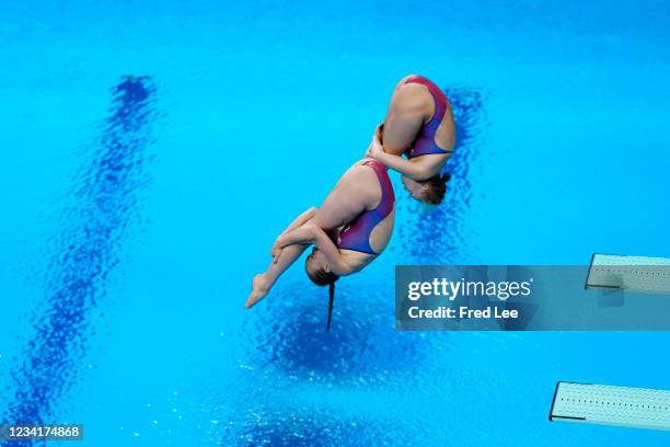 Alison Gibson and Krysta Palmer of Team United States compete during Women's 3m Springboard Finals on day two of the Tokyo 2020 Olympic Games at...