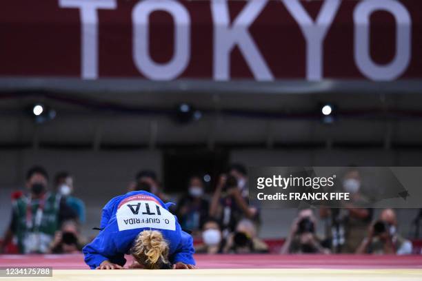 Italy's Odette Giuffrida reacts after defeating Hungary's Reka Pupp during their judo women's -52kg bronze medal A bout during the Tokyo 2020 Olympic...