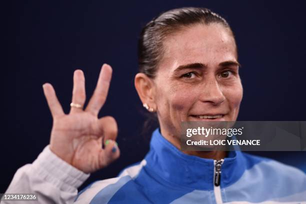Uzbekistan's Oksana Chusovitina poses after competing in the artistic gymnastics vault event of the women's qualification during the Tokyo 2020...