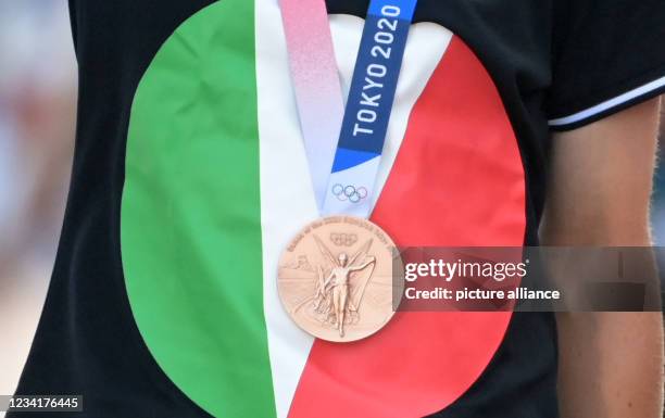 July 2021, Japan, Oyama: Cycling: Olympics, Tokyo - Oyama , women, road race, award ceremony. The bronze medal of the Italian Elisa Longo Borghini....