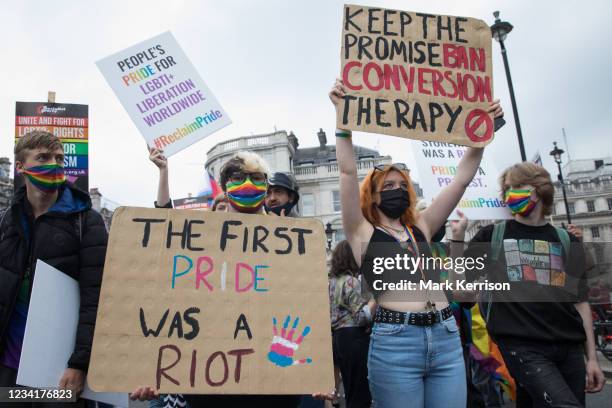 Thousands of LGBTI+ protesters pass through Trafalgar Square on the first-ever Reclaim Pride march on 24th July 2021 in London, United Kingdom....