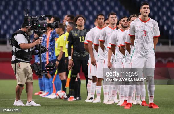Mexico's players sing their national anthema head of the Tokyo 2020 Olympic Games men's group A first round football match between Japan and Mexico...
