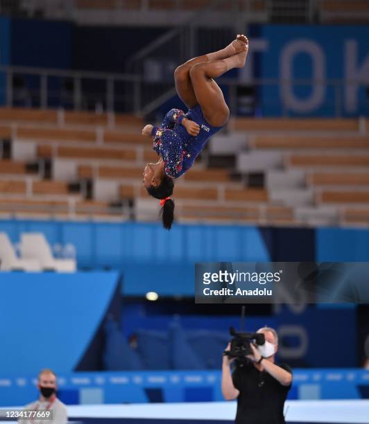 Simone Biles of the US competes in the artistic gymnastic floor event of the women's qualification during the Tokyo 2020 Olympic Games at Ariake...