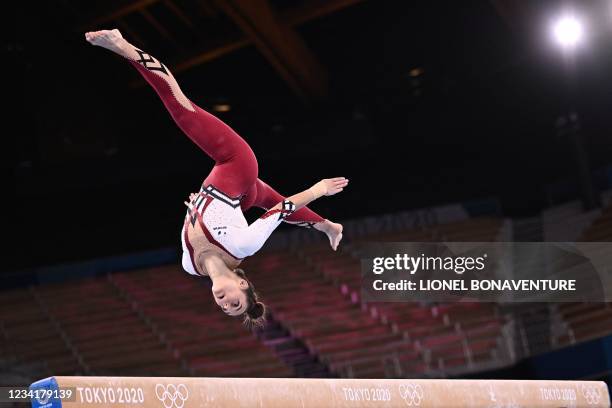 Germany's Pauline Schaefer-Betz competes in the artistic gymnastics balance beam event of the women's qualification during the Tokyo 2020 Olympic...