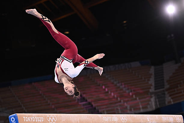 Germany's Pauline Schaefer-Betz competes in the artistic gymnastics balance beam event of the women's qualification during the Tokyo 2020 Olympic...