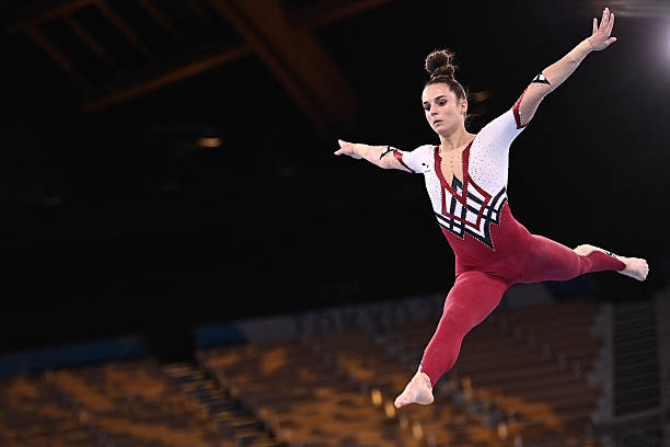 Germany's Pauline Schaefer-Betz competes in the artistic gymnastics balance beam event of the women's qualification during the Tokyo 2020 Olympic...