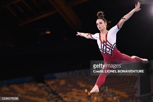 Germany's Pauline Schaefer-Betz competes in the artistic gymnastics balance beam event of the women's qualification during the Tokyo 2020 Olympic...