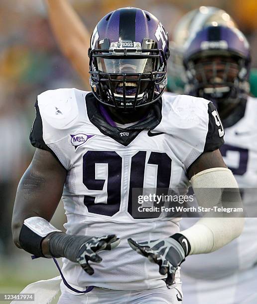 Texas Christian University defensive end Stansly Maponga celebrates a sack in the first quarter against Baylor at Floyd Casey Stadium in Waco, Texas,...