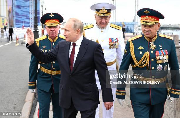 Russian President Vladimir Putin , Western Military District Colonel-General Alexander Zhuravlev , Admiral Nikolai Yevmenov and Russian Defense...