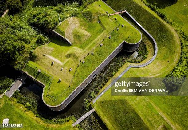 This aerial picture taken on July 25 in Bunnik, near Utretch, shows the Fort Vechten, part of the New Dutch Waterline. - The national monument, a...
