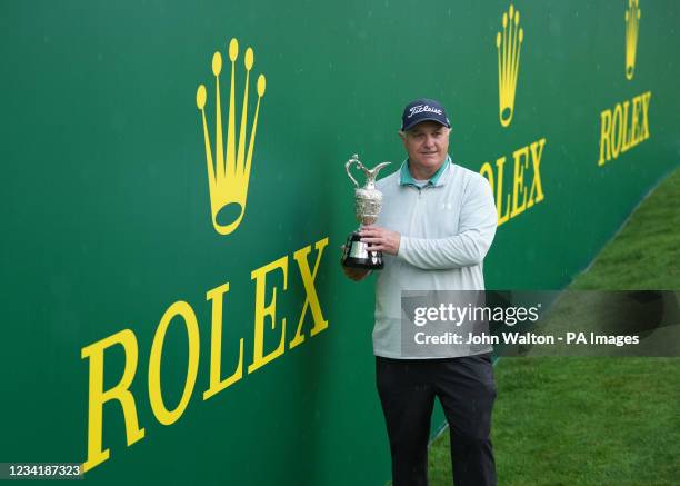 Wales' Stephen Dodd holding the trophy after winning the Senior Open on day four, at Sunningdale Old Course, Berkshire. Picture date: Sunday July 25,...