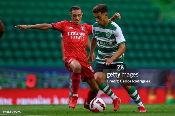 Pedro Goncalves of Sporting CP tries to escape Maxence Caqueret of Olympique Lyonnais during the Pre-Season Friendly match Cinco Violinos Trophy...