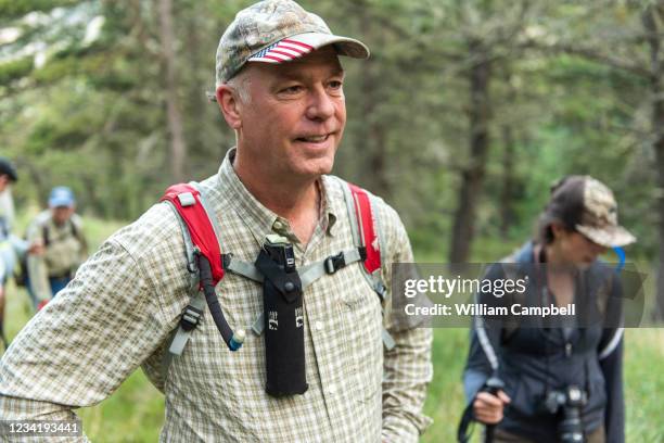 Montana Republican Governor Greg Gianforte joins generational family members on a hike through grizzly bear county on July 24, 2021 in Emigrant,...