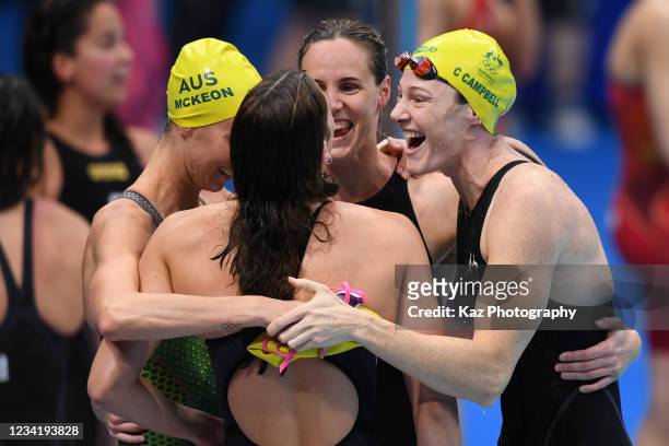 Team Australia celebrates their win of the Women's 4 x 100m Freestyle Relay with new World Record on day two of the Tokyo 2020 Olympic Games at Tokyo...